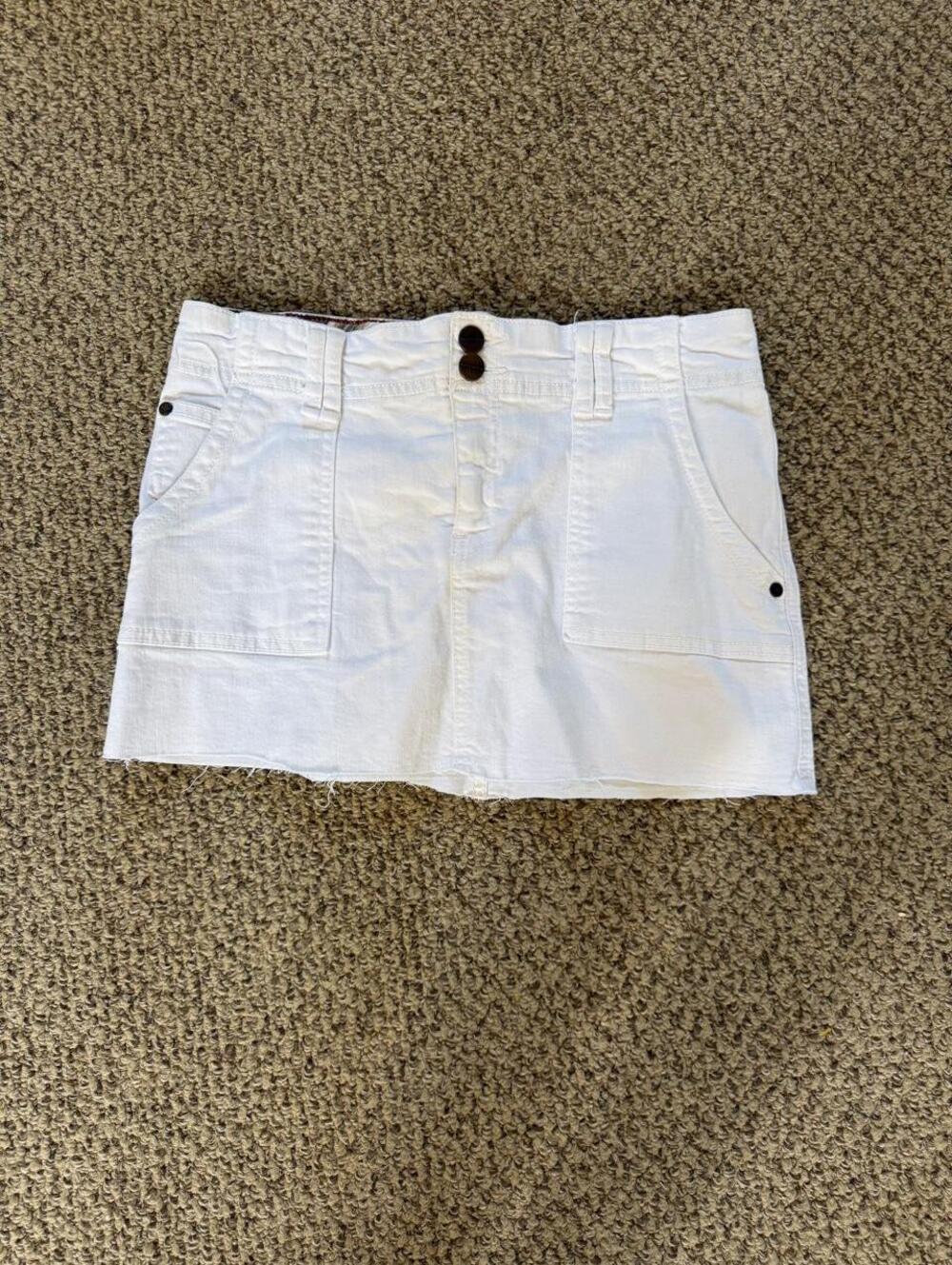White y2k mini skirt with brown buttons and pockets